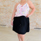 Just a Flirt Pleated Skirt in Black