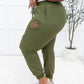 Kick Back Distressed Joggers In Olive